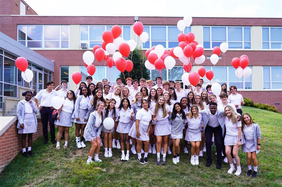 St. John's College students with baloons, peer ministers 2022