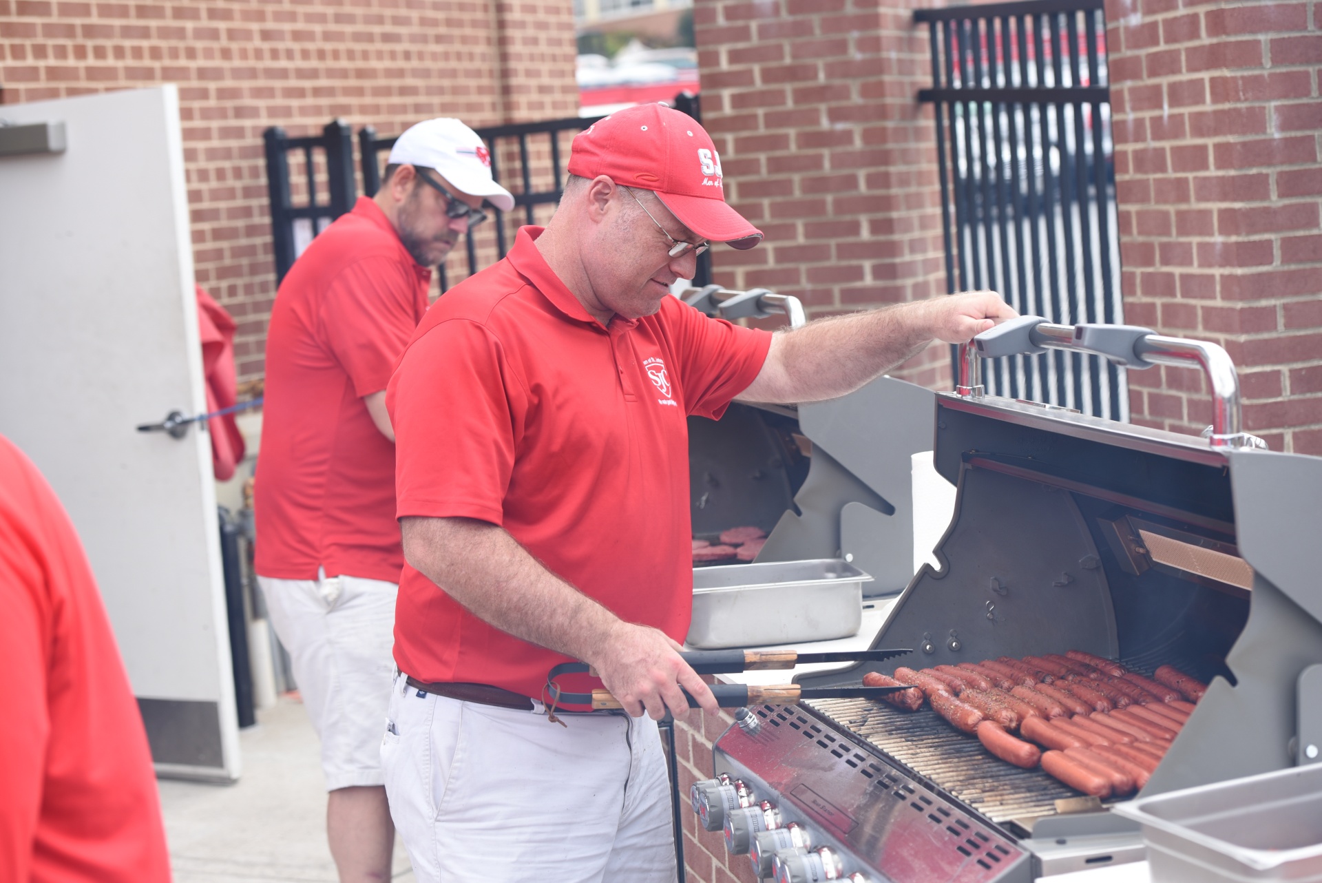 Men of SJC hotdogs event