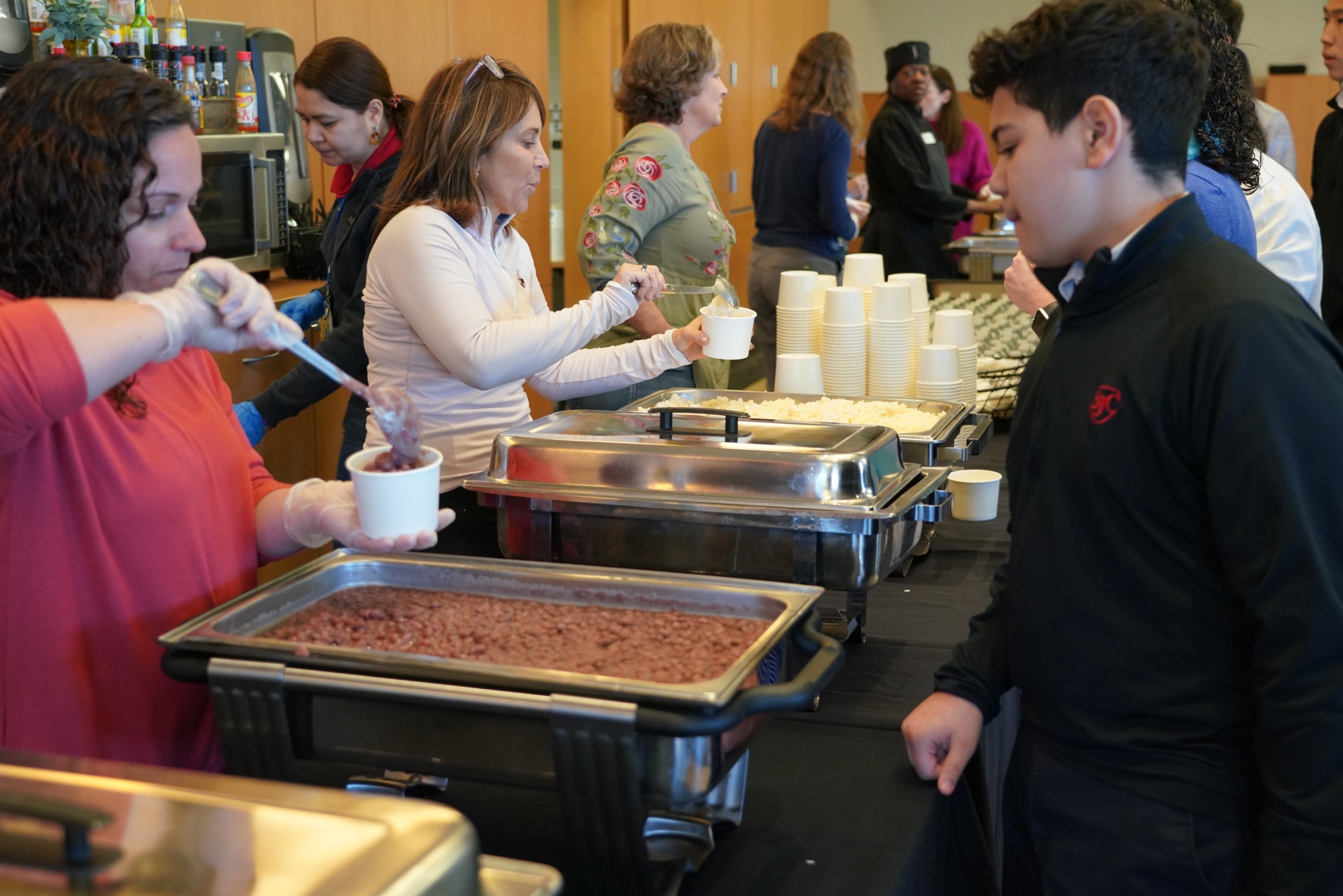 SJC Mothers' Club serving meals